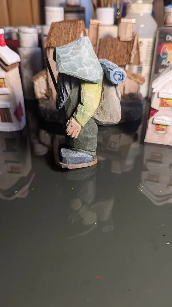 Dan Reiger.         Hand-carved wooden gnome figurine image indicator(2)