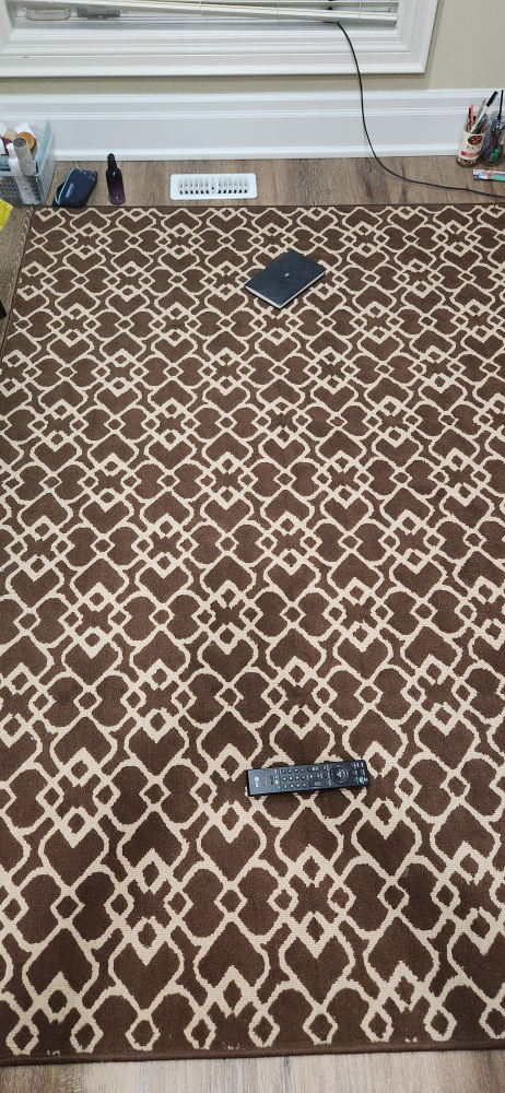 Brown and beige patterned rug