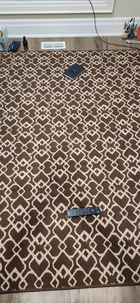 Brown and beige patterned rug - photo 3