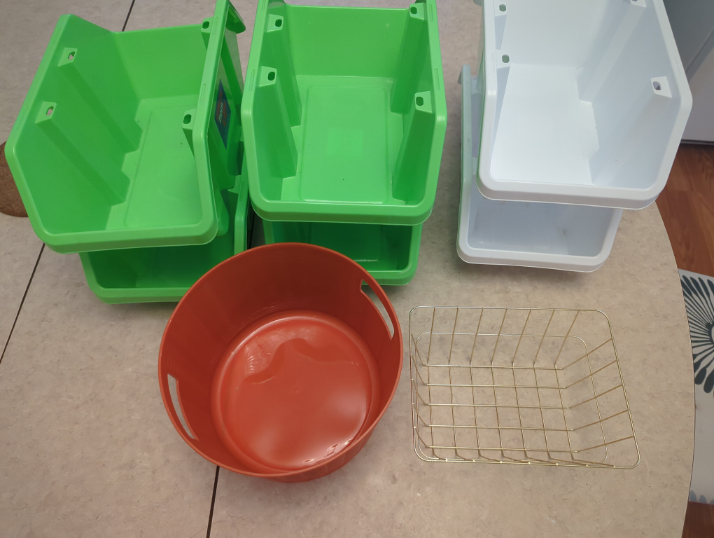 Green and White Storage Bins and Orange Container