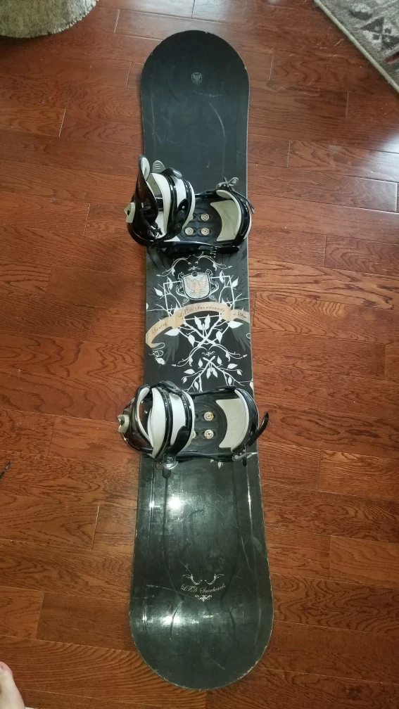 Used snowboard with bindings and helmet - photo 3