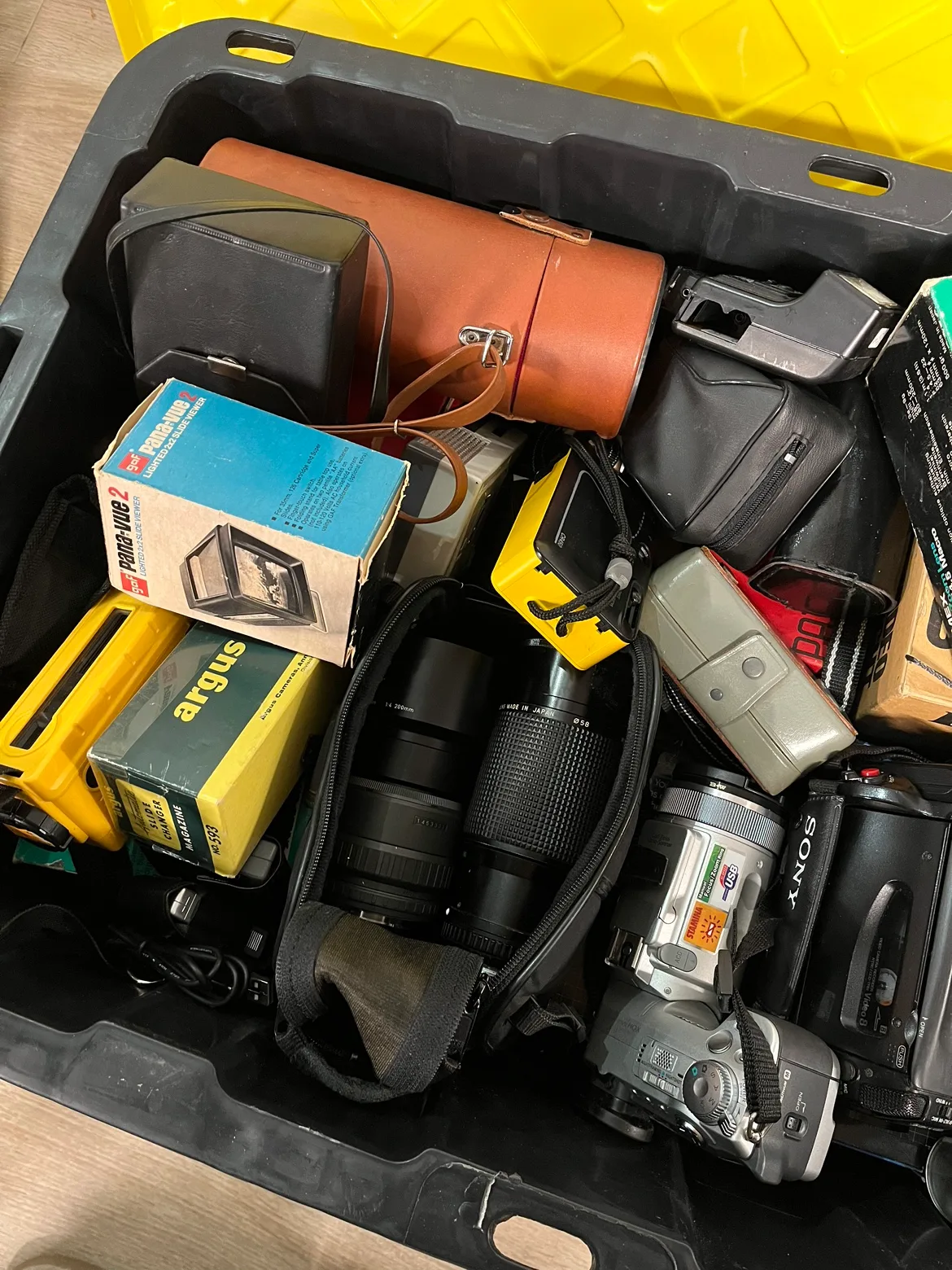 A bin full of random antique cameras and gear image indicator(3)