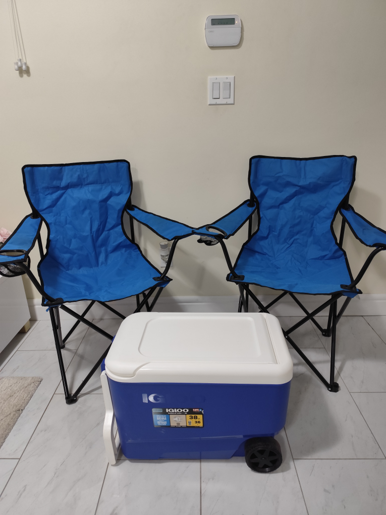 Igloo Cooler, Two Folding Chairs, and beach tent