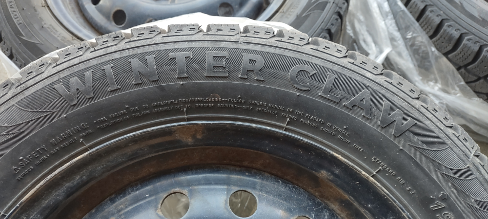4 x 4-lug bolt Steel Wheels  (Incl. Winter Claw Tires) - photo 4
