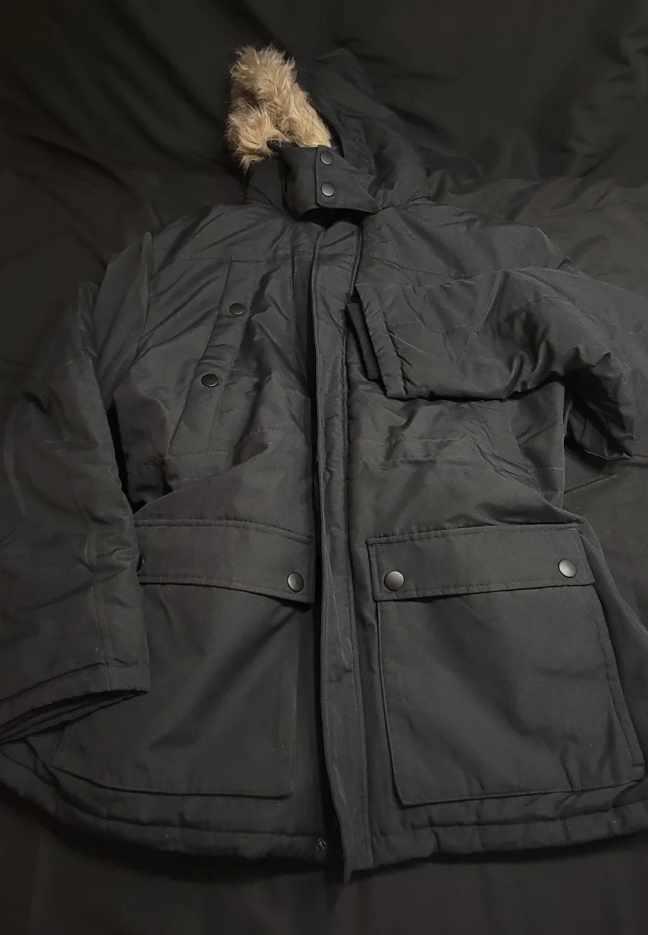 Black winter parka with faux fur hood. image indicator(7)