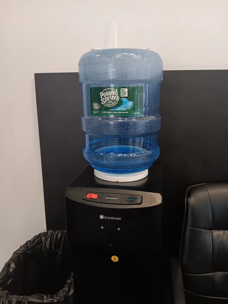 Water Cooler and Gallon of Poland Spring Water thumbnail