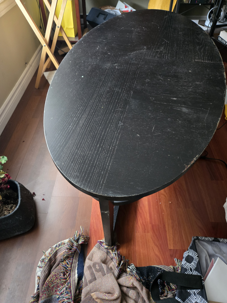 Black oval coffee table with shelf - photo 2