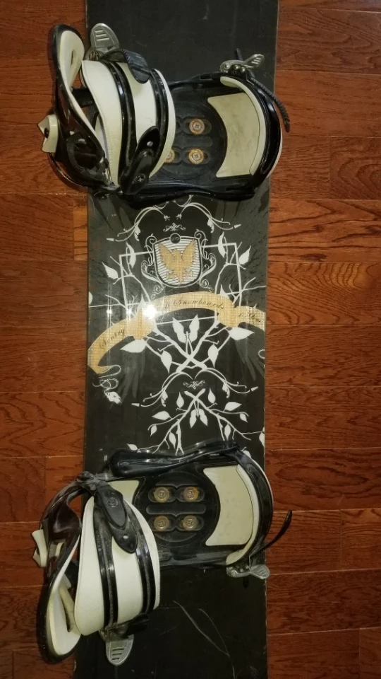 Used snowboard with bindings and helmet