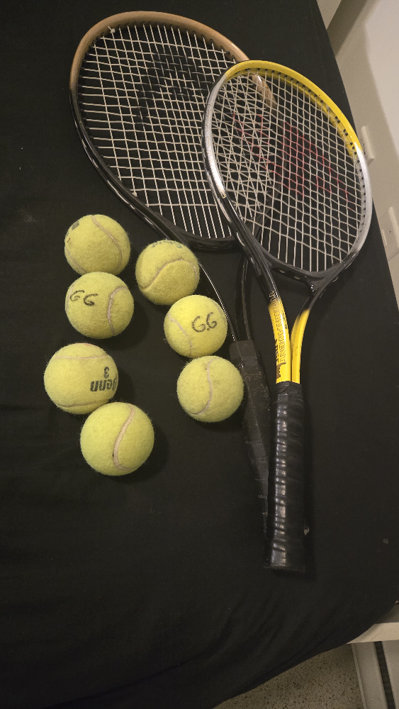 Two Tennis Rackets and Balls
