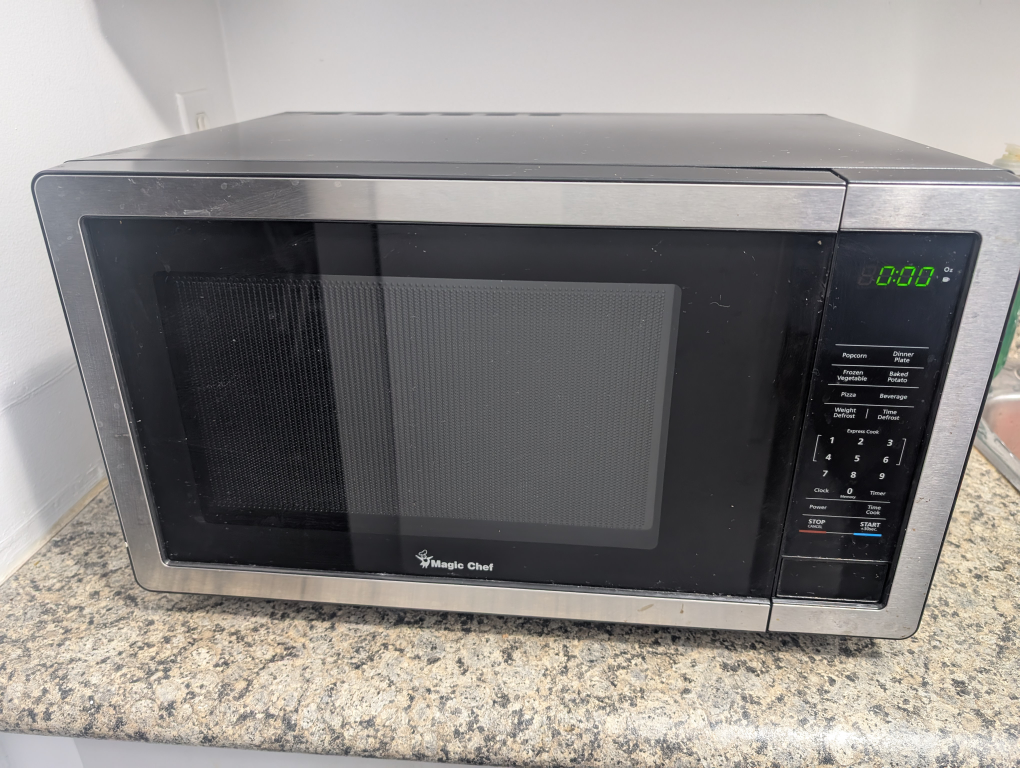 Magic Chef 1.1 Cu. Ft. Countertop Microwave Oven - photo 2