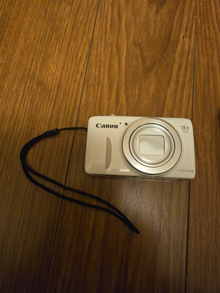 White Canon SX600 HS Powershot + Charger & Case image indicator(2)