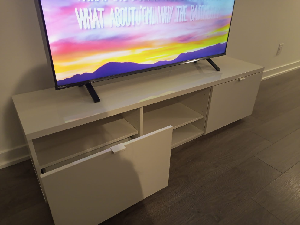 New TV stand less than a year old !