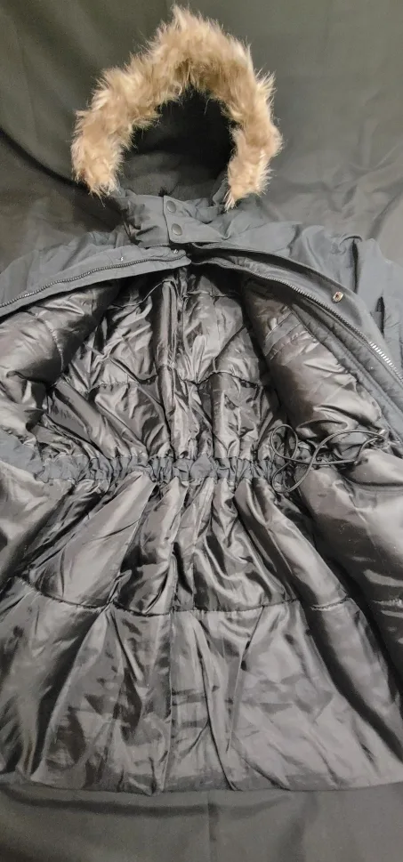 Black winter parka with faux fur hood. image indicator(3)