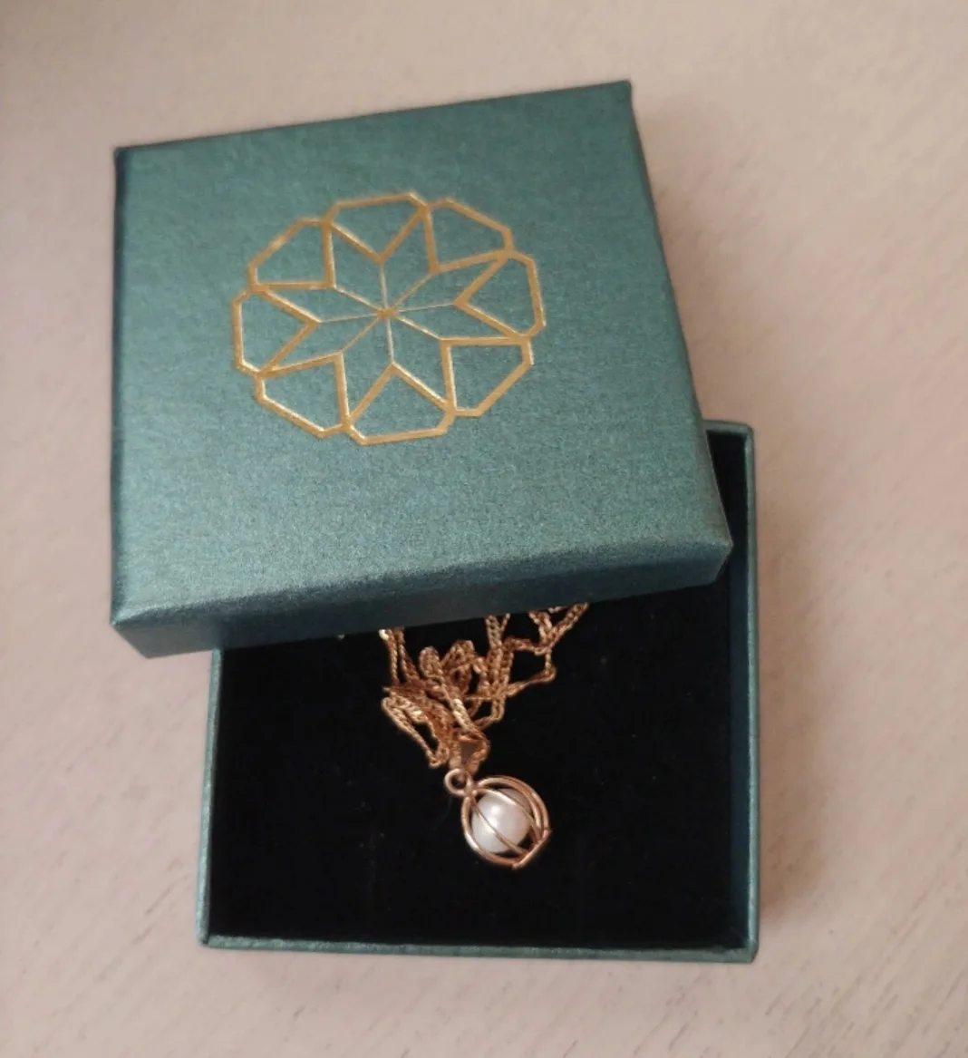 Gold-Plated Pearl Cage Necklace image indicator(2)