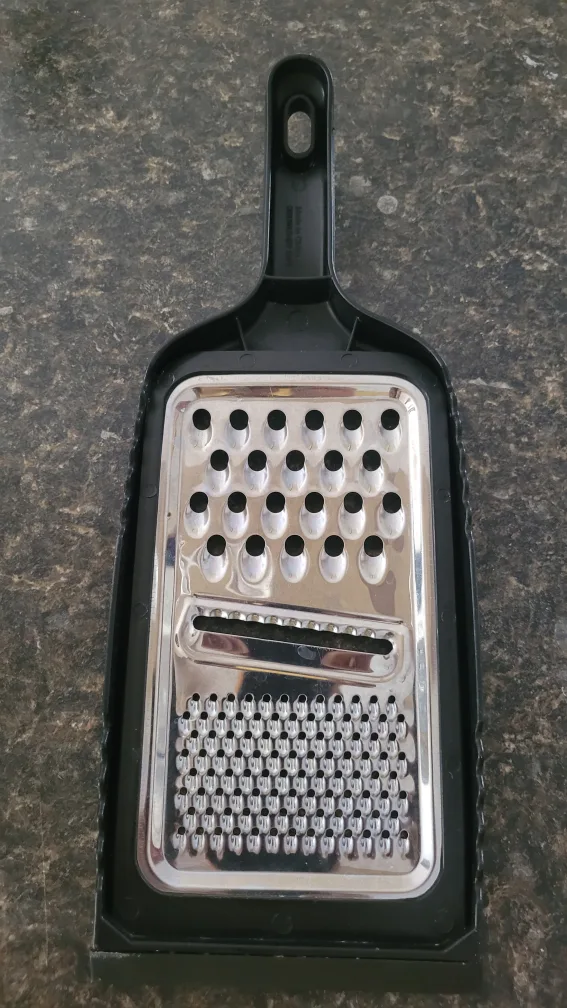 Stainless Steel Grater with Black Handle image indicator(2)