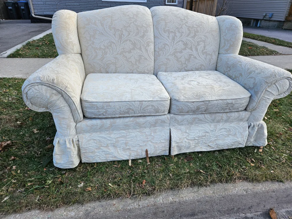 FREE beige loveseat with floral pattern thumbnail
