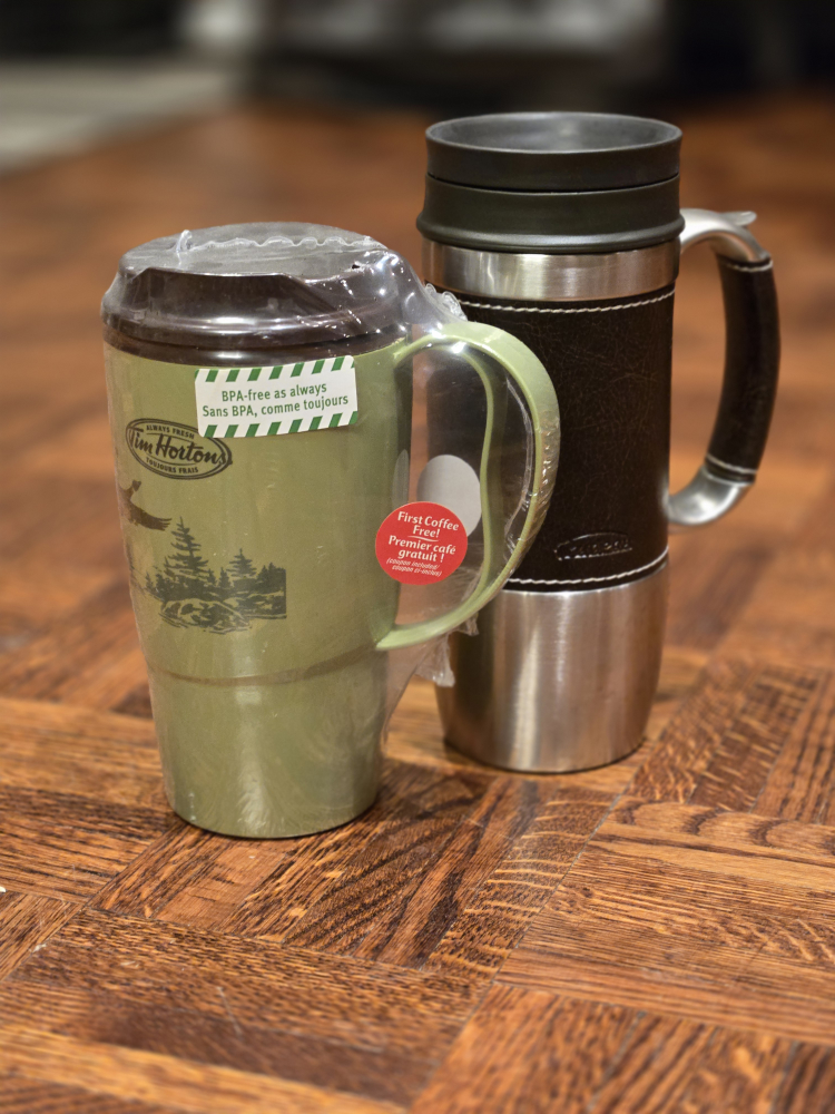 2x travel coffee mugs + free coffee