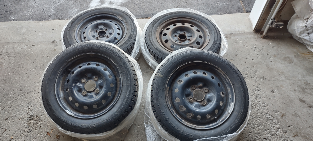 4 x 4-lug bolt Steel Wheels  (Incl. Winter Claw Tires)