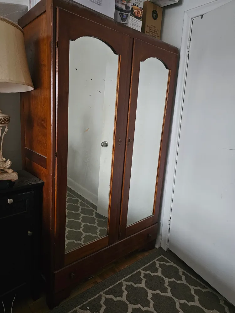 Antique Wooden Armoire with Mirrored Doors thumbnail