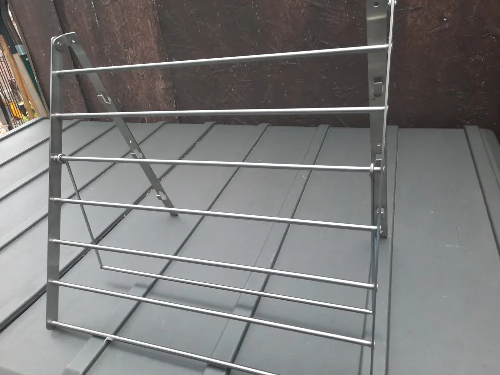 Like New collapsible wall mounted clothes rack image indicator(2)