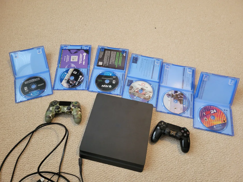 PS4 Console with 2 Controllers, 6 games & accessories image indicator(3)