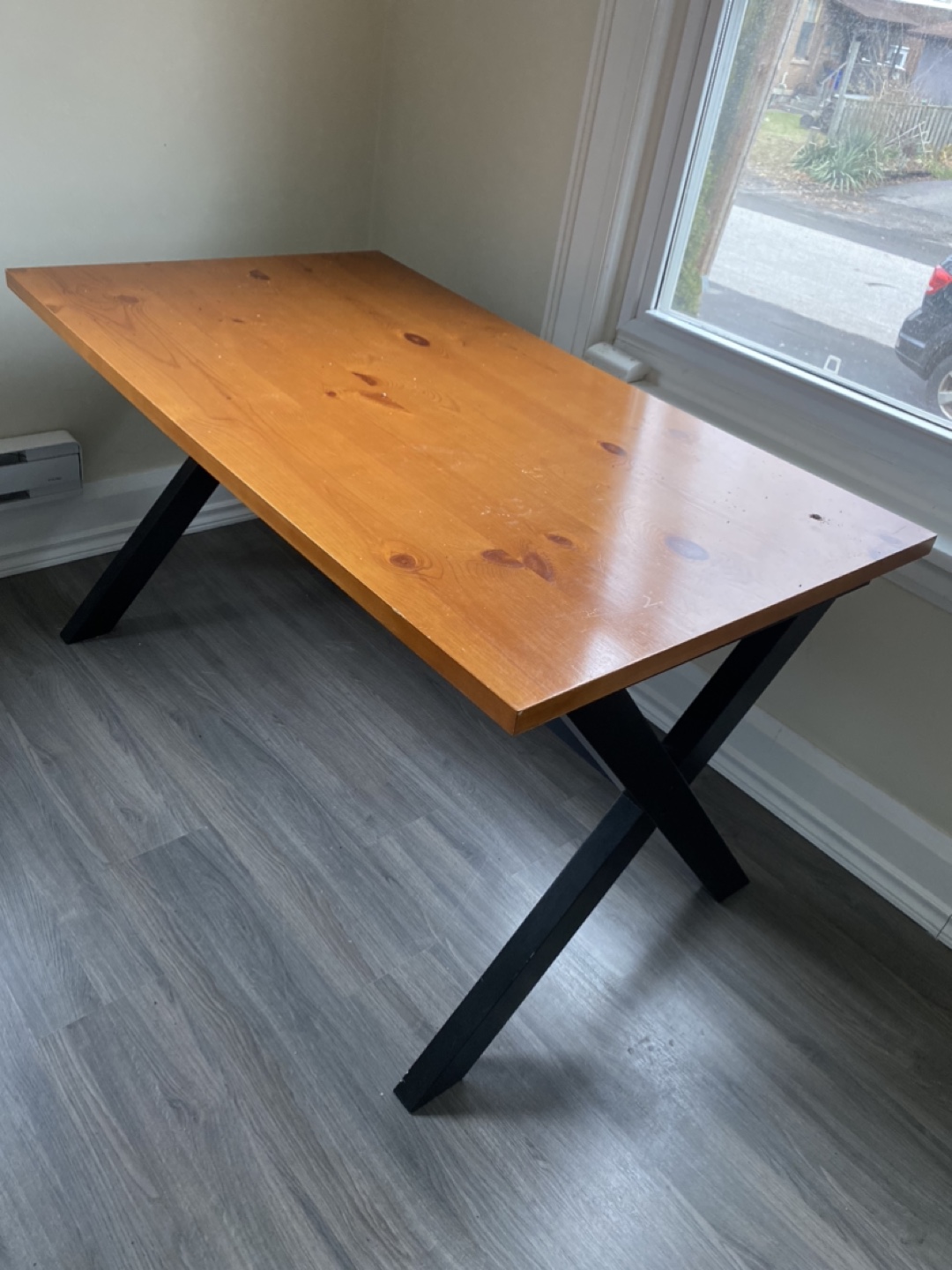 Wooden Table with Black X-Shaped Legs