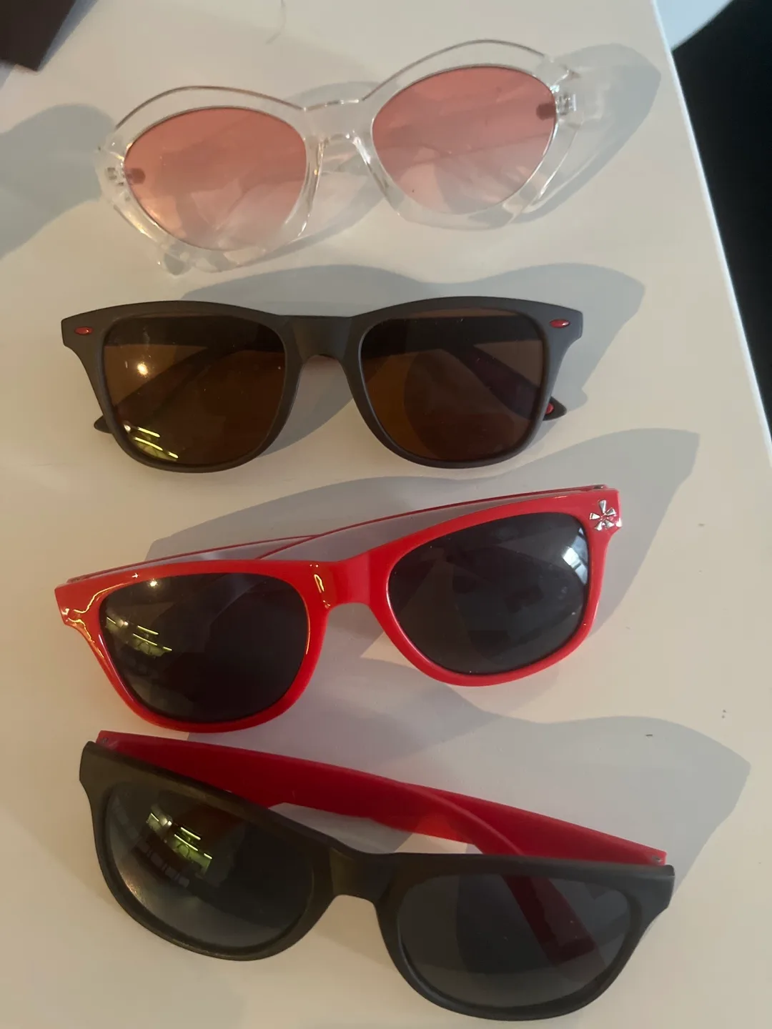 4 Pairs of Sunglasses image indicator(2)