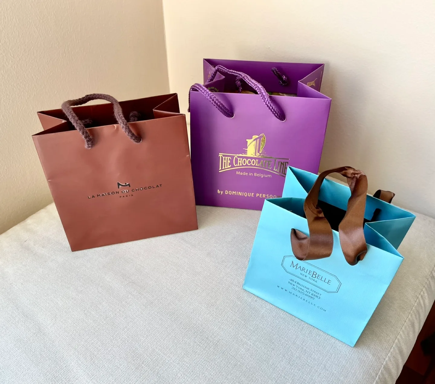 HOLIDAY GIFT BOXES AND THREE GIFT BAGS FROM LUXURY BOUTIQUES image indicator(2)