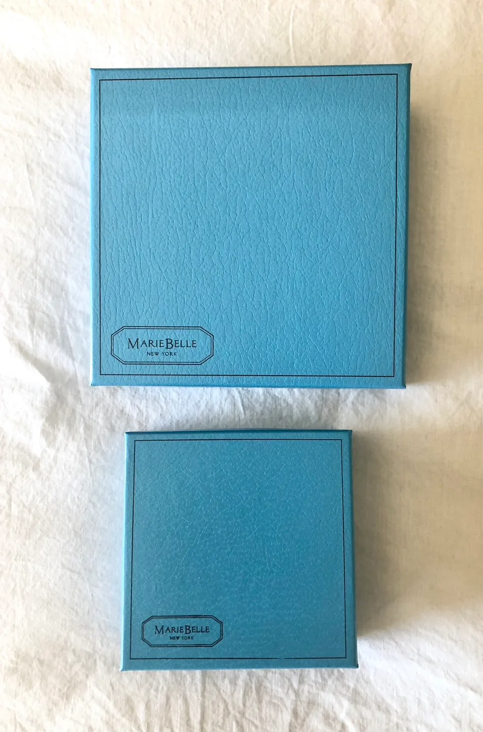 HOLIDAY GIFT BOXES AND THREE GIFT BAGS FROM LUXURY BOUTIQUES image indicator(3)