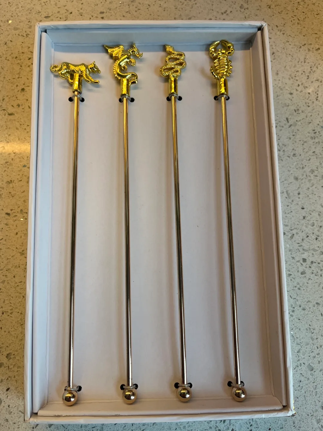CB2 Prowl Gold Cocktail Stirrers Set of 4 image indicator(2)