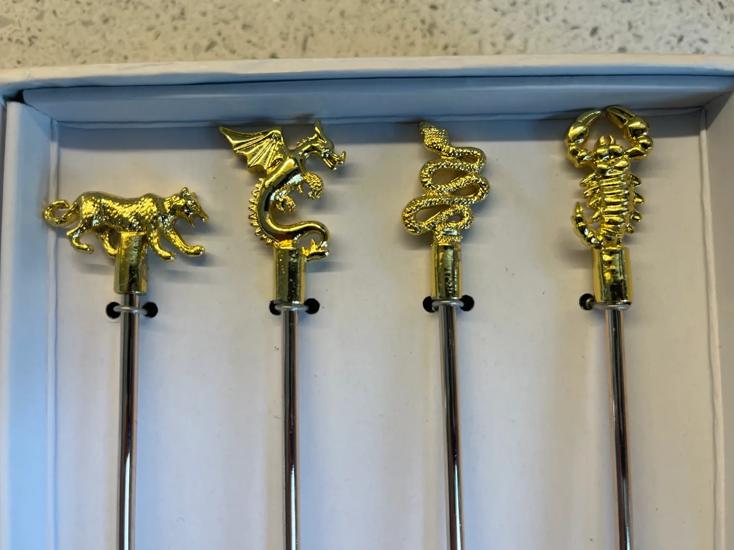 CB2 Prowl Gold Cocktail Stirrers Set of 4 image indicator(3)