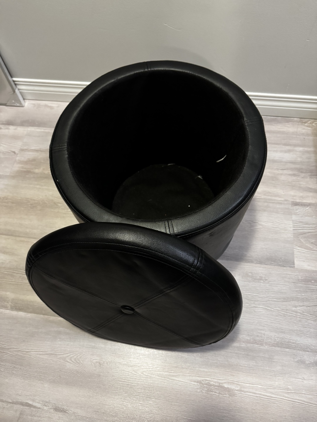 Faux leather ottoman with storage