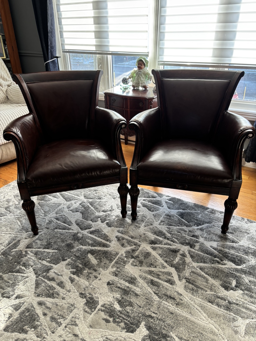 Two Brown Leather Accent Chairs