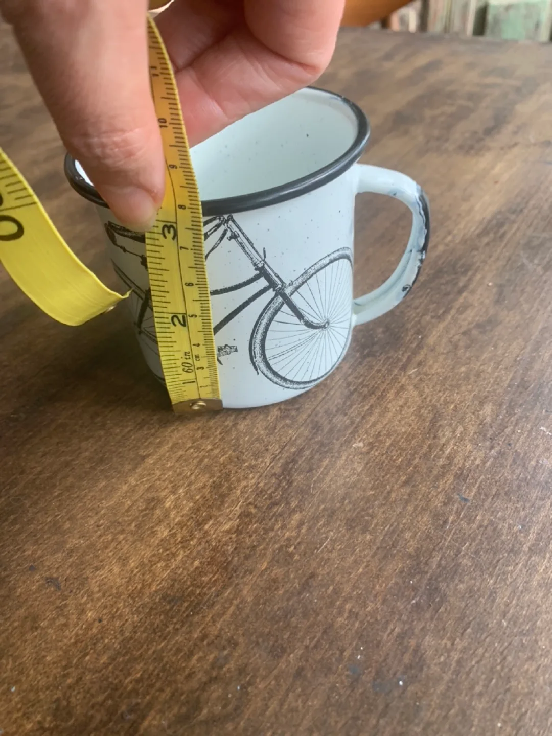 Handcrafted enamel mug with bicycle from Artesano Canada image indicator(6)