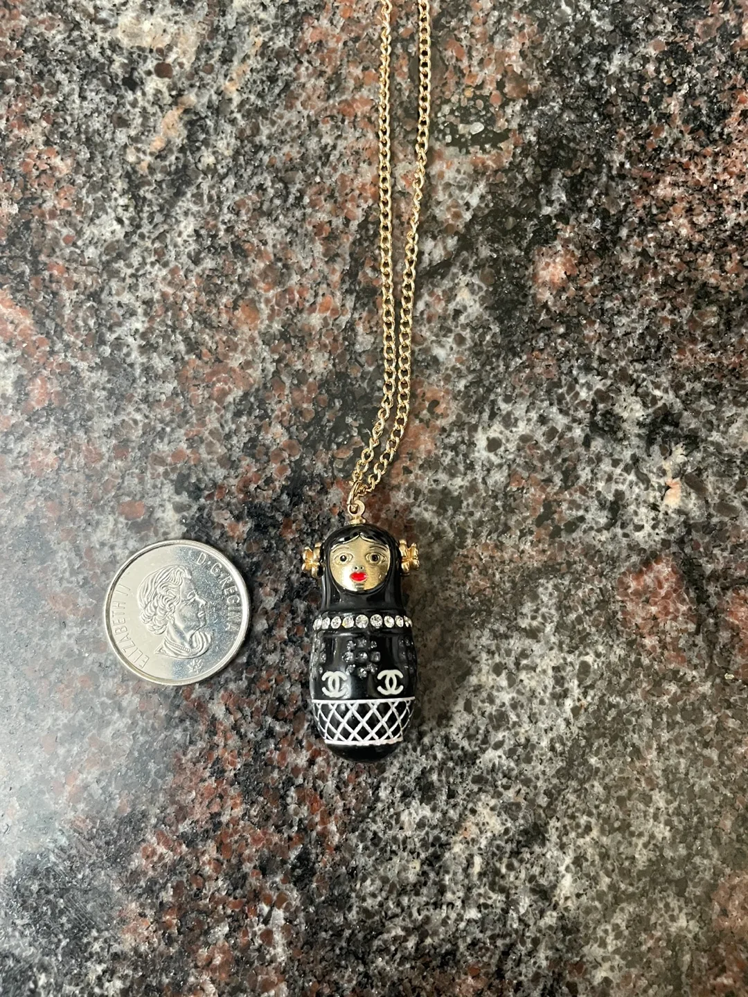 Black and Gold Nesting Doll Necklace image indicator(2)