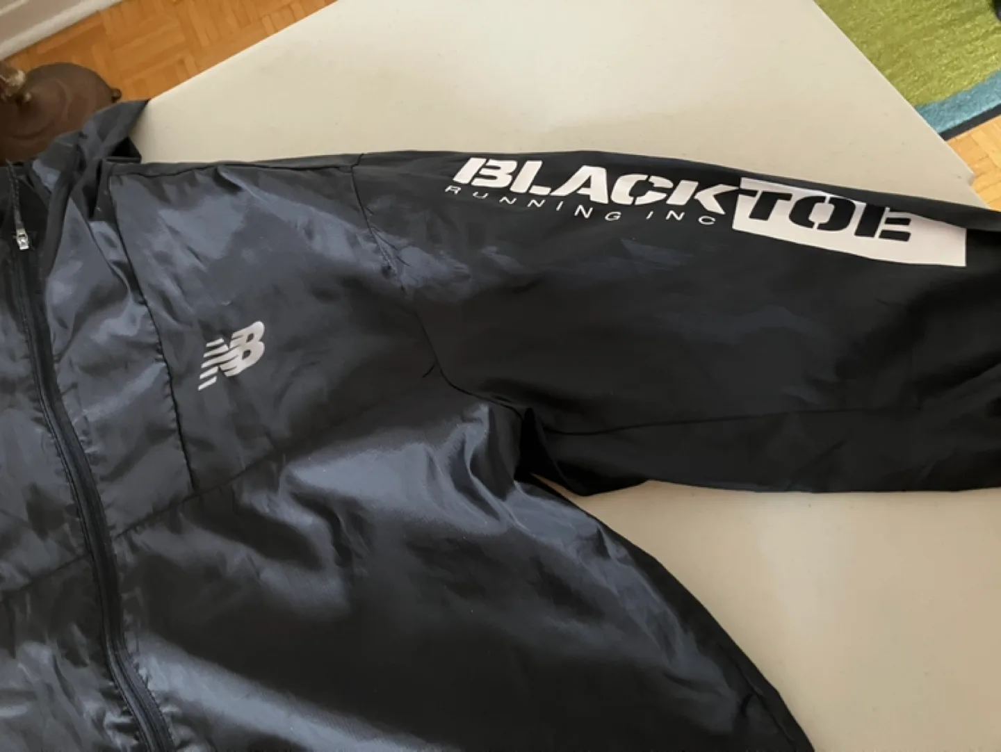 New Balance Blacktoe Running Jacket image indicator(3)