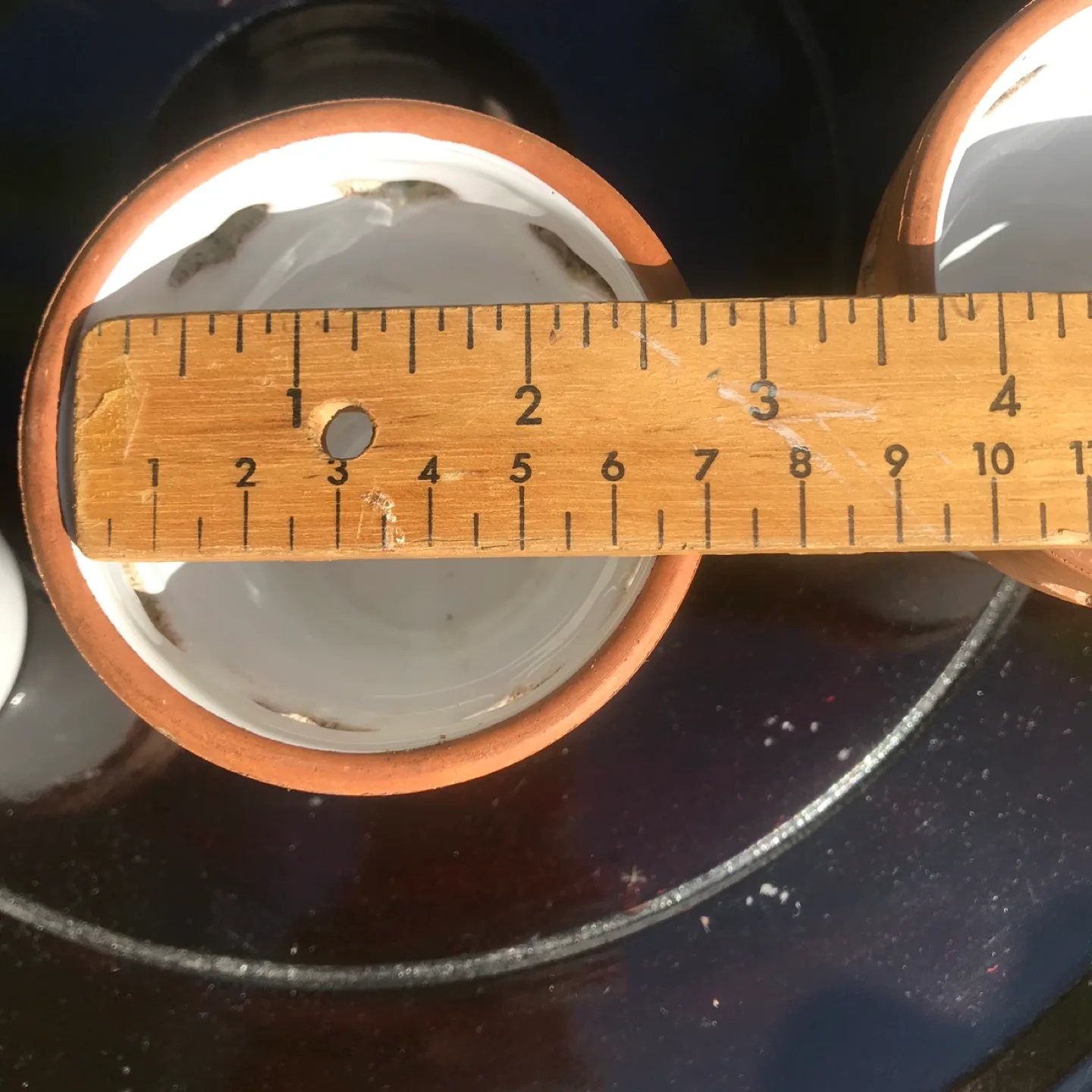 Set of 3 Terracotta Pots with Heart Cutouts image indicator(4)