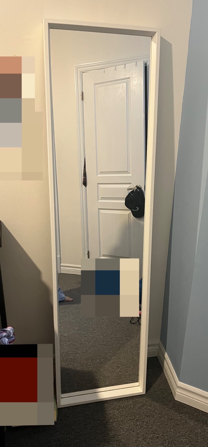 Full-length mirror with white frame