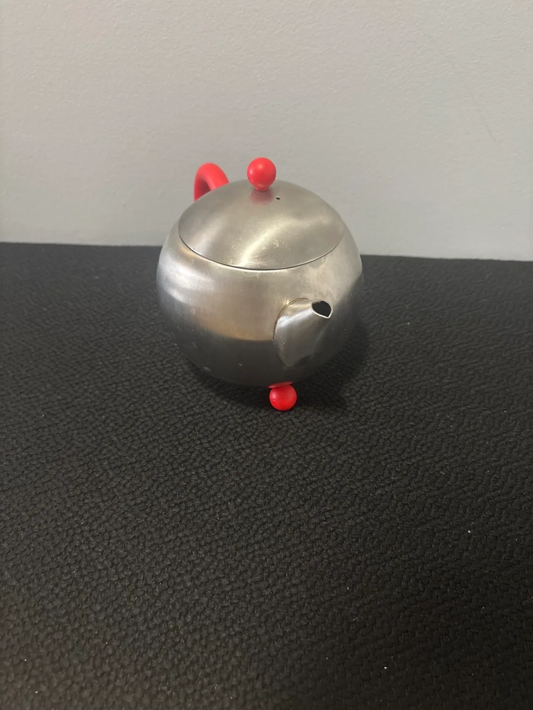 Stainless Steel Teapot with Red Handle and Accents image indicator(2)