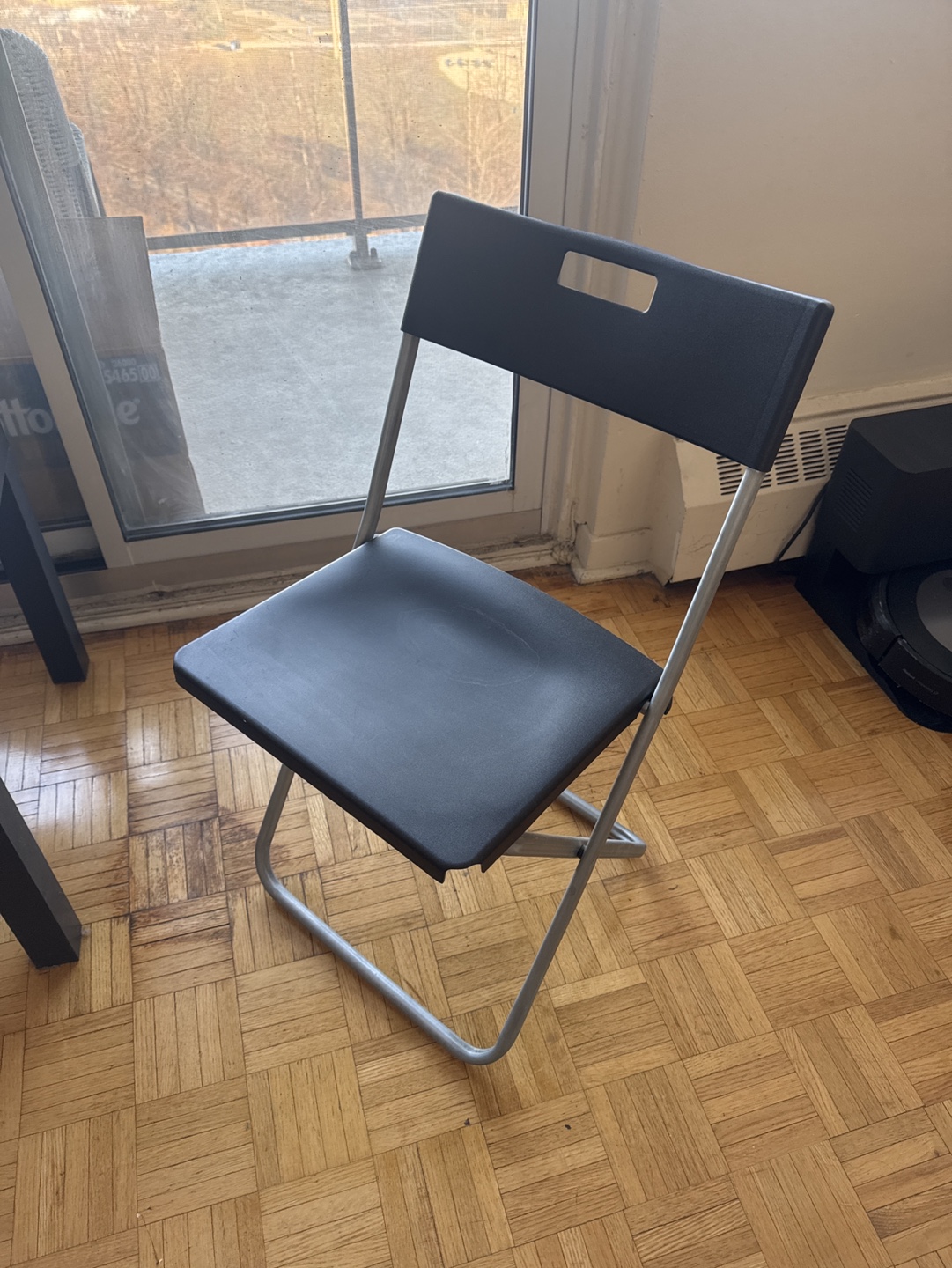 Black folding chairs and side table - photo 2