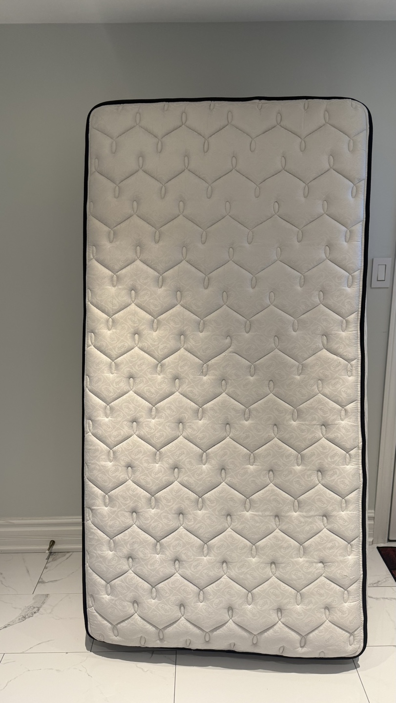 One Sealy Posturepedic Mattress