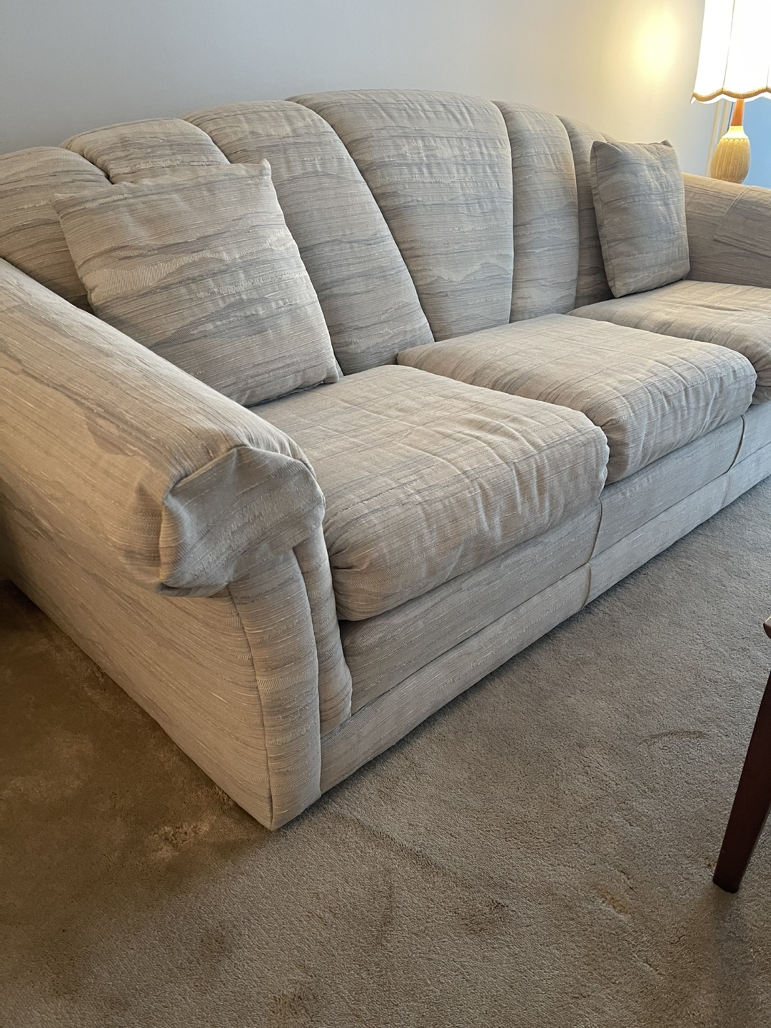 Beige Sofa with Three Cushions