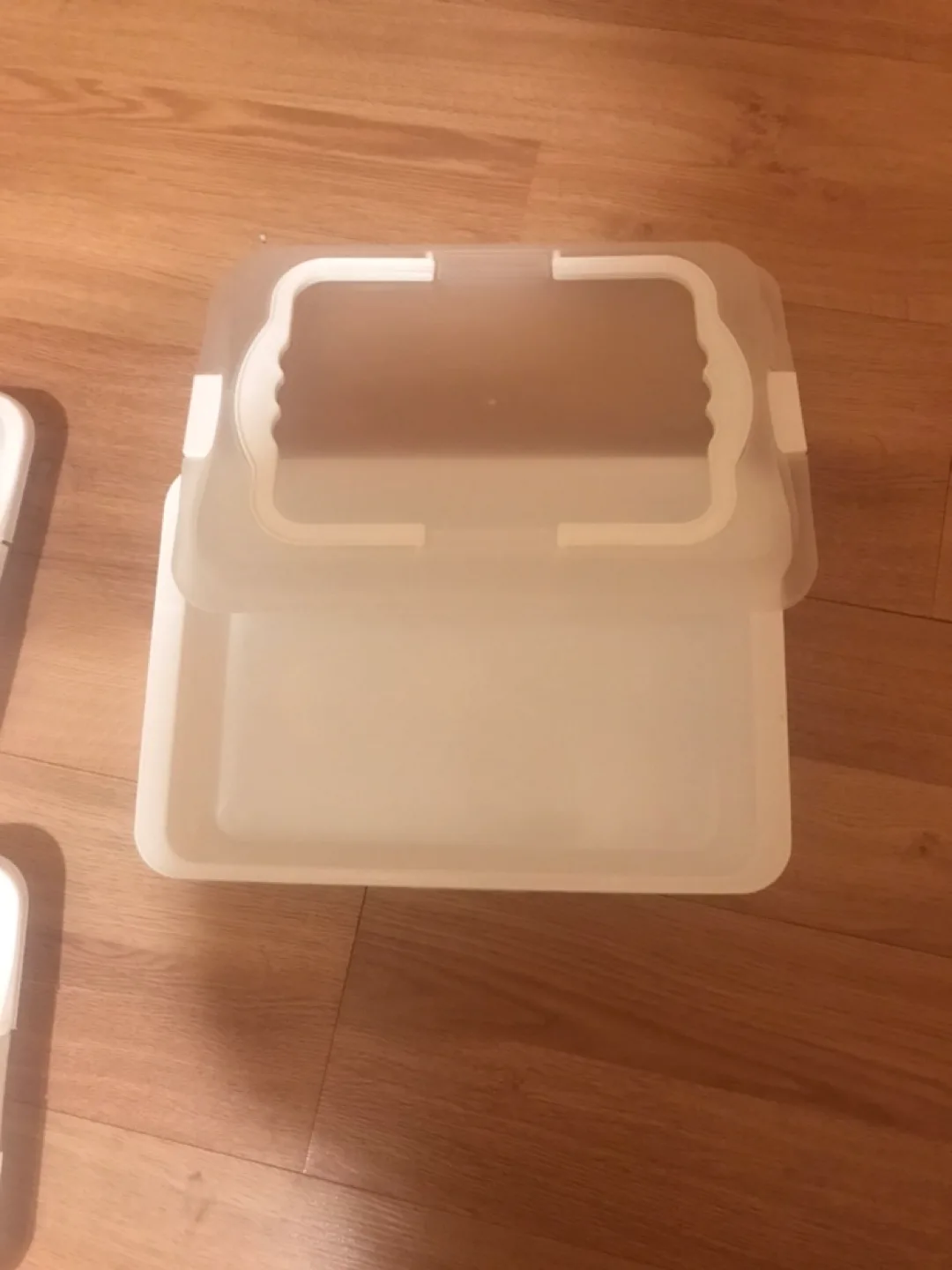 Set of 4 Stackable Plastic Storage Containers with Lids image indicator(2)