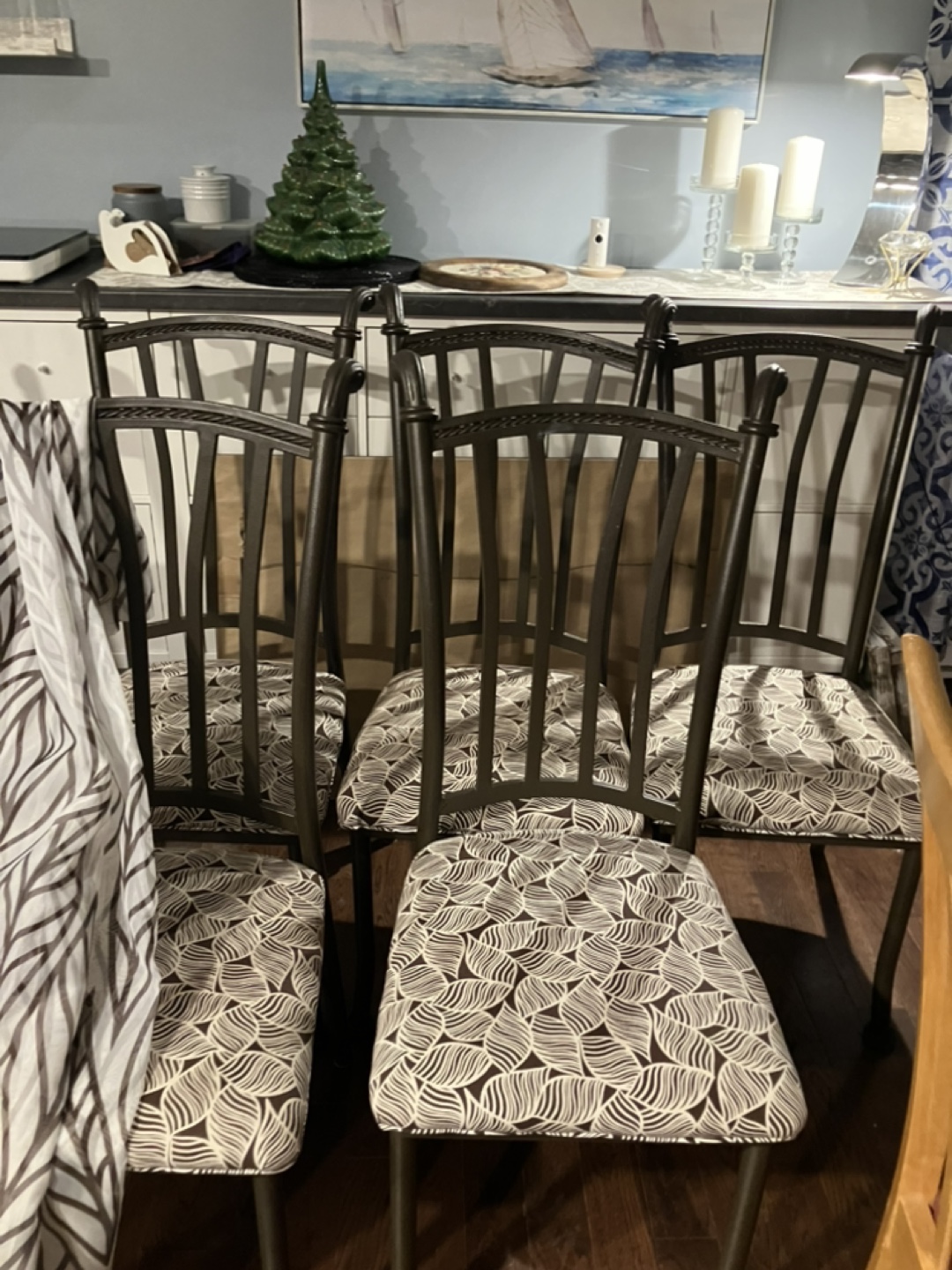 Six Metal Dining Chairs with Leaf-Pattern Cushions
