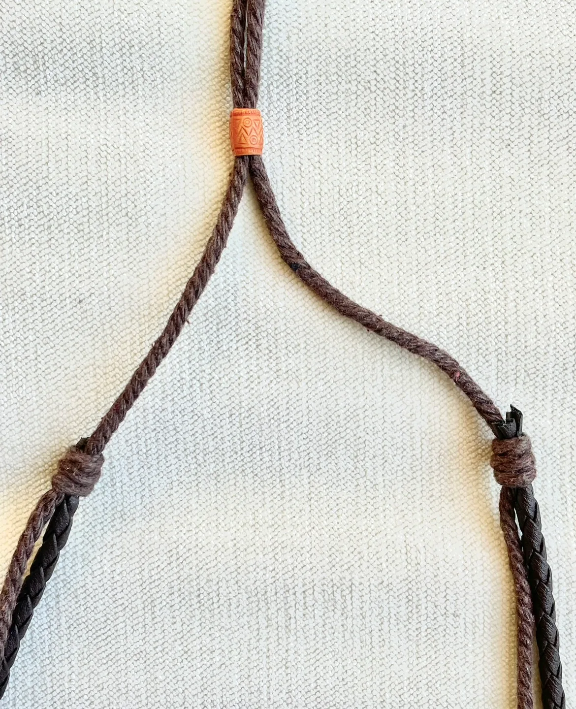 HANDMADE BEAD AND CHARM NECKLACE WITH BRAIDED LEATHER image indicator(6)