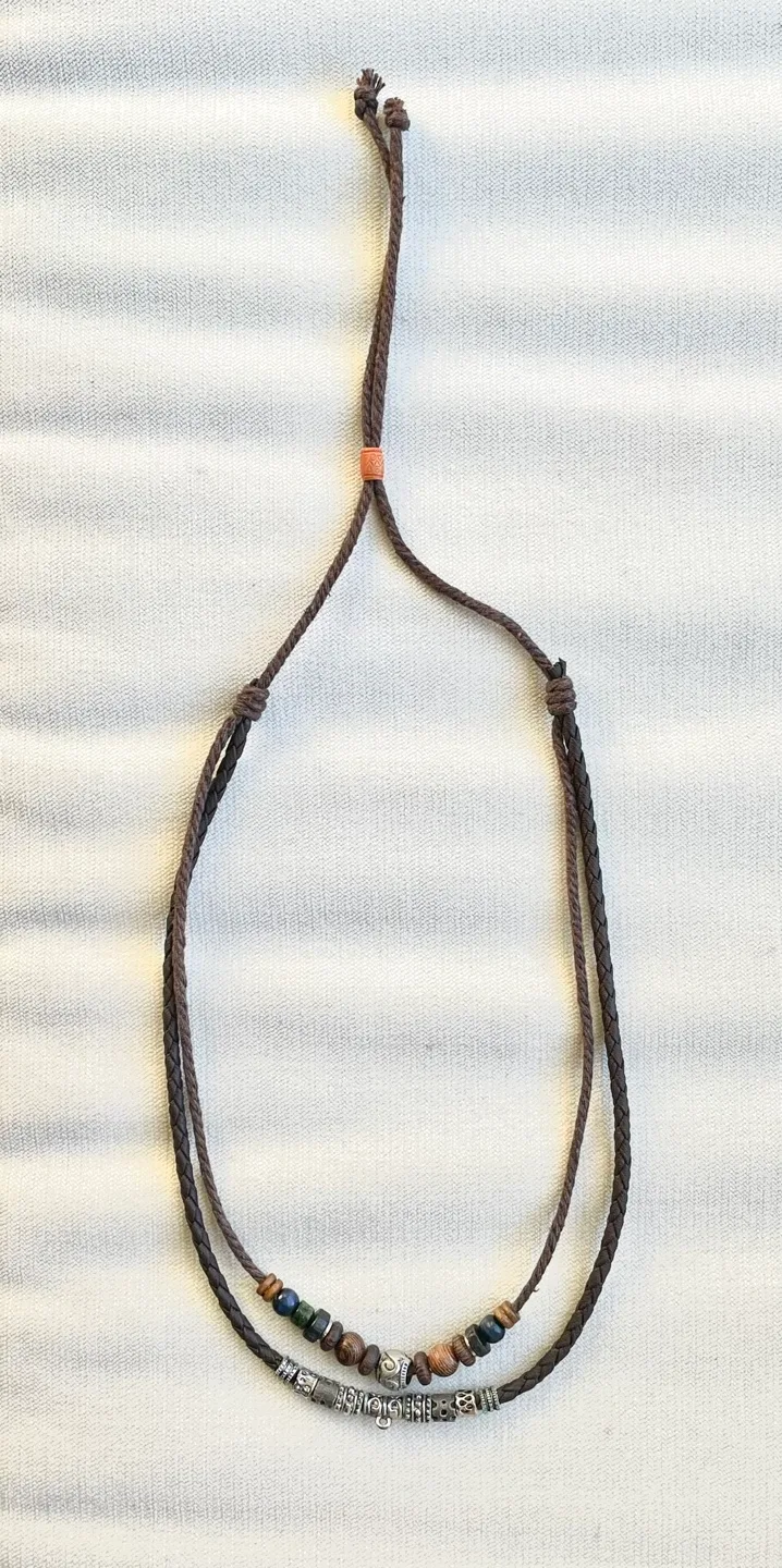 HANDMADE BEAD AND CHARM NECKLACE WITH BRAIDED LEATHER image indicator(5)