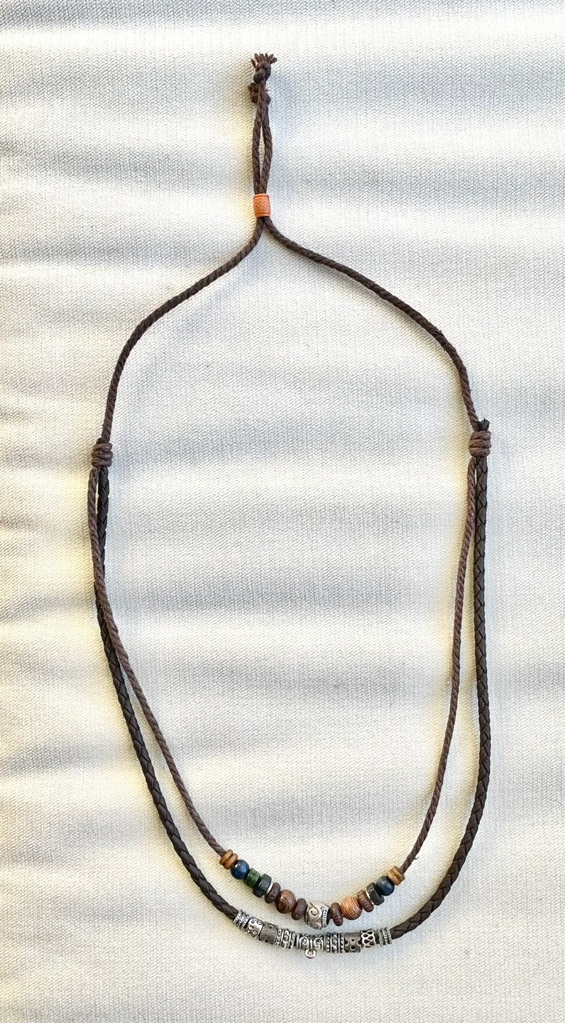 HANDMADE BEAD AND CHARM NECKLACE WITH BRAIDED LEATHER image indicator(4)