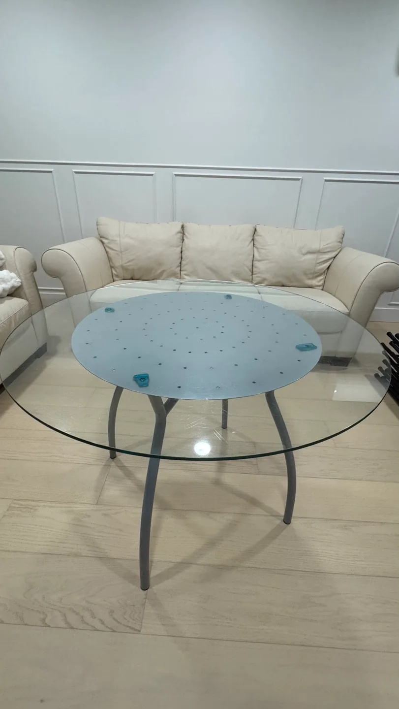 Glass top coffee table with unique curved metal legs image indicator(2)