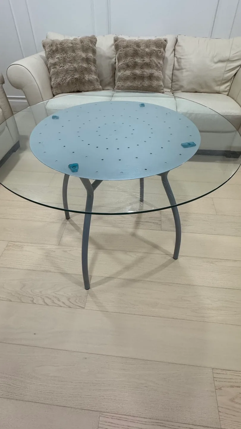 Glass top coffee table with unique curved metal legs image indicator(5)