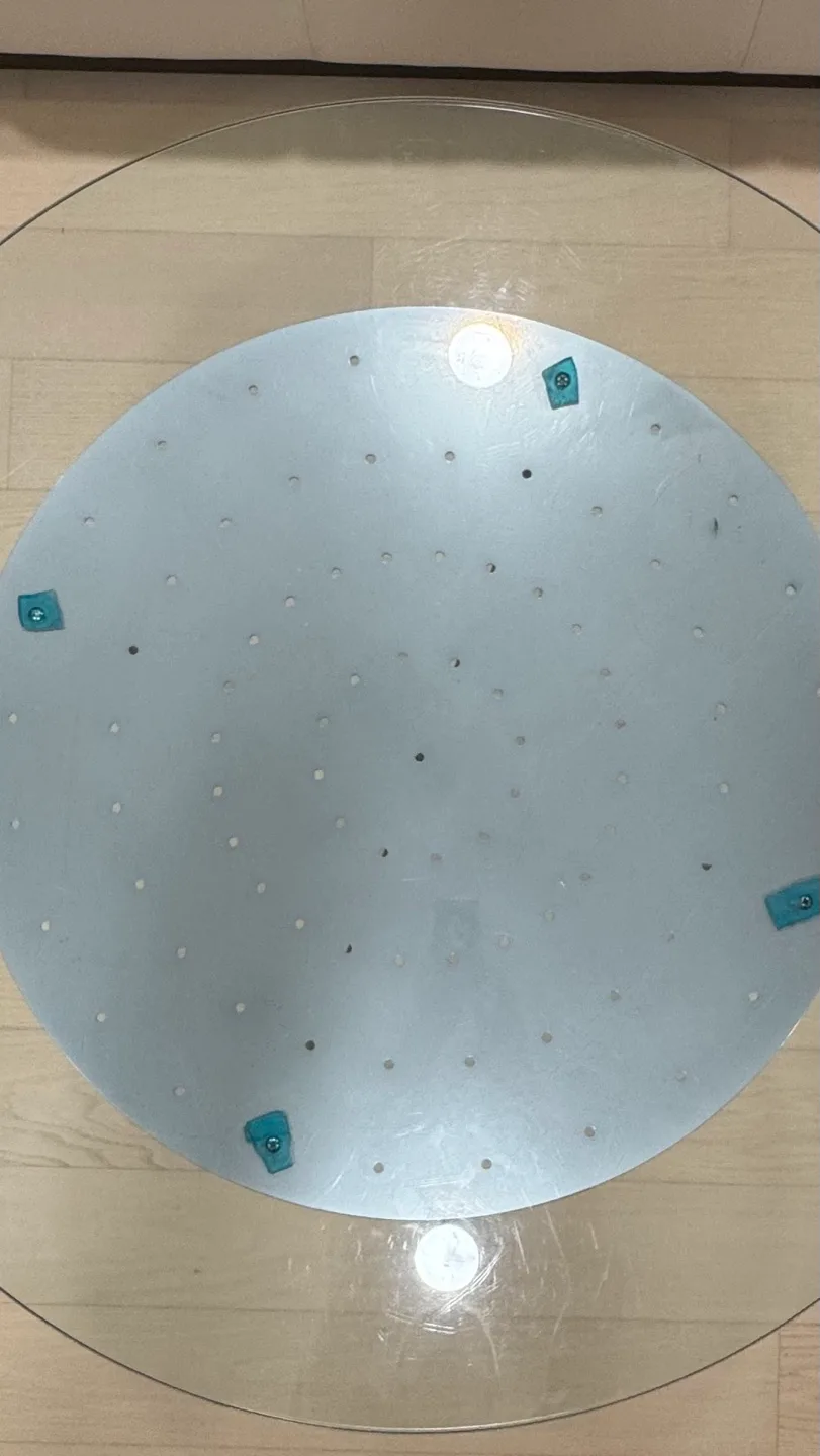 Glass top coffee table with unique curved metal legs image indicator(7)